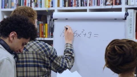 University students solving math problem together 스톡 동영상 335138859