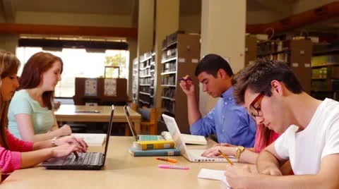 University students studying in the library Stock Footage 22385176