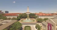 The University Of Texas Longhorns' Administrative Tower And Fountain Stock Footage