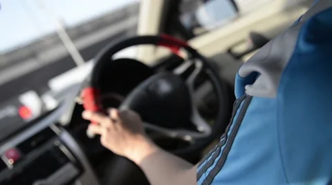 Unknown asian man  drive car Video stock 63174262