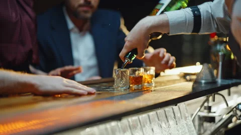 Unknown barista pouring shots serving clients in party closeup. People drinking Stock Footage 319801515