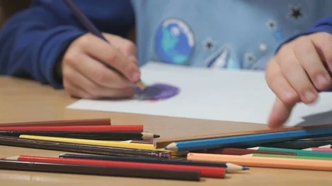 Unknown boy drawing pictures Stock Footage 83227869