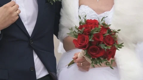Unknown bride and groom walking together Stock Footage 81842625