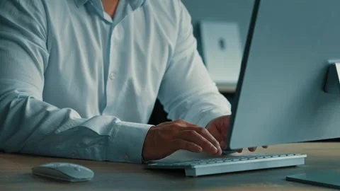 Unknown businessman programmer male worker IT specialist man work in office Stock Footage 218361175
