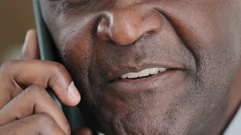 Unknown half face part old wrinkled emotional businessman African mature man Video stock 201863385