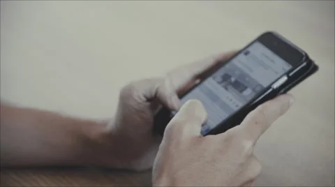 Unknown   male use smartphone with touch screen  to use for social networking Stock Footage 64949290