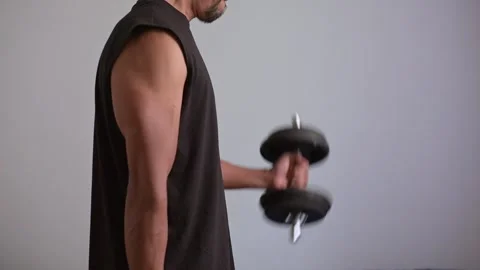Unknown man exercising with dumbbell Stock Footage 307459589