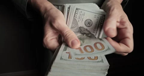 Unknown man hands calculating dollar. Unrecognizable man counting american Stock Footage 251979789