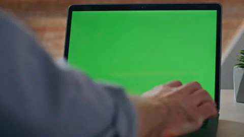 Unknown man hands typing keyboard greenscreen laptop morning workplace closeup Stock Footage 268336804
