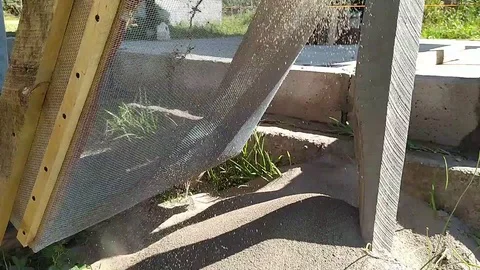 A unknown man sifting sand Stock Footage 127192719