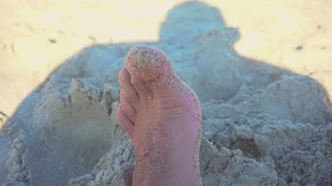 Unknown man steps barefoot into scorching hot white sand on idyllic exotic beach Video stock 134067122