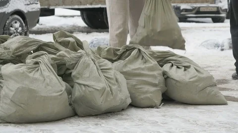 Unknown man taking bag with debris Stock Footage 80802939