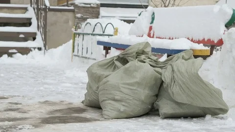 Unknown man taking bag with debris Stock Footage 80804139