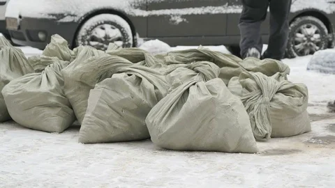 Unknown man taking bag with debris Stock Footage 81076460