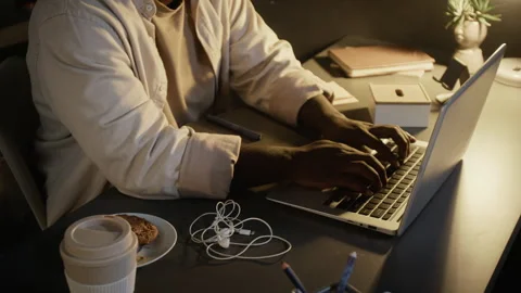 Unknown Man Typing on Laptop Working Overtime at Office Stock Footage 348155159