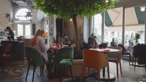 Unknown people in a cafe, shooting of the interior. Stock-Footage 306657743