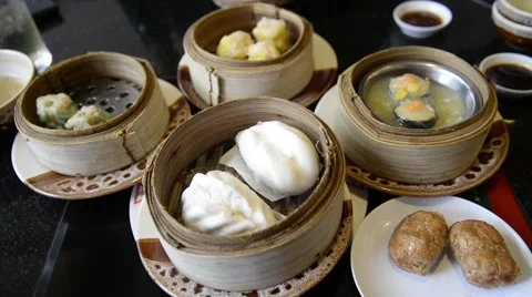 Unknown people eat Steam dumpling eating top view Stock Footage 63351287
