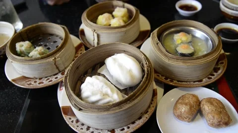 Unknown people eat Steam dumpling eating top view Stock Footage 63351305
