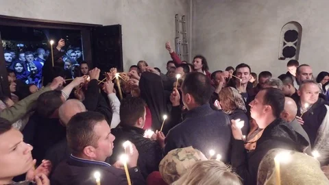 Unknown people sing during celebration of Orthodox Easter Stock Footage 74951044