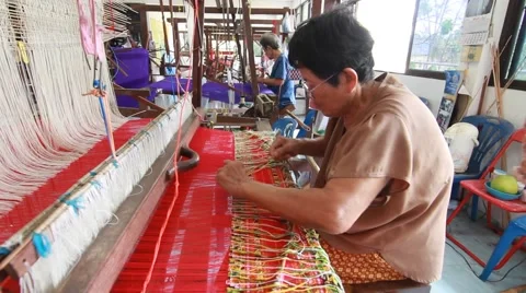 Unknown persons were weaving, The occupation of the villagers of Thailand Stock Footage 62235466