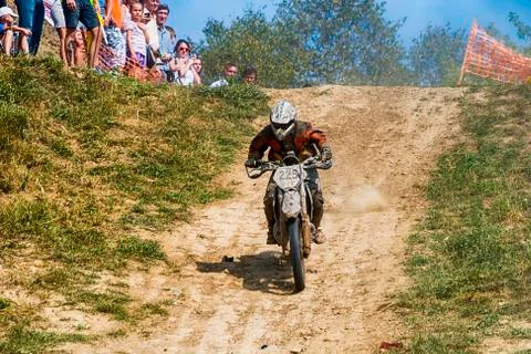 Unknown racer overcomes the track Stock Photos