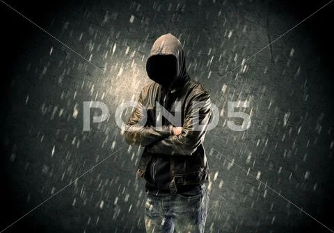 Unknown suspect standing in the dark Stock Photos