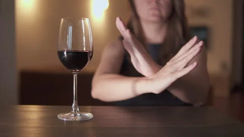 Unknown woman is refusing wine. Sober lifestyle Stock Footage 321989153