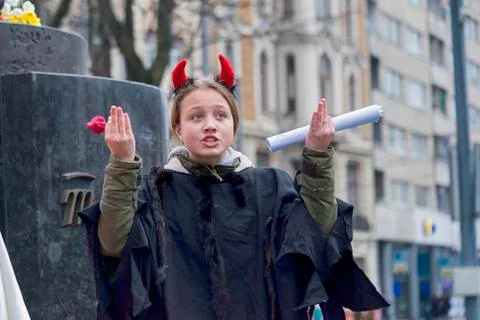 Unknown young actor in role devil plays for the citizens in a Christmas perfo Stock Photos