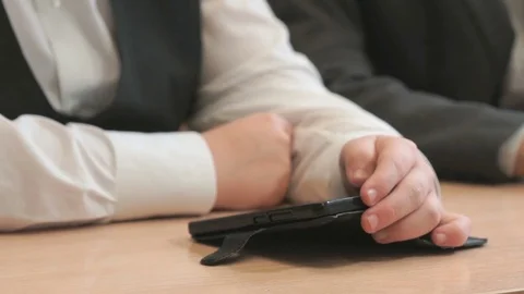 Unknown young man with smartphone. Close-up Stock Footage 81311519