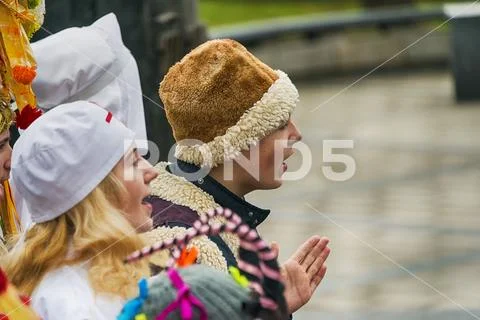 Unknown young people play for the citizens a Christmas performance Stock Photos