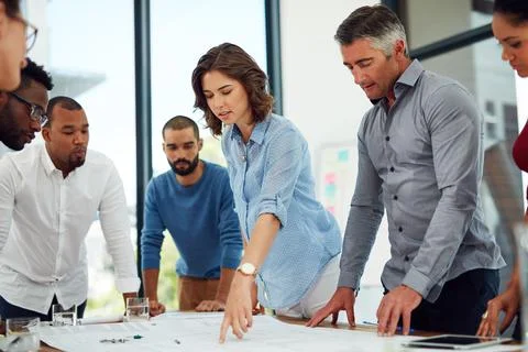 Unleash your creativity. a group of architects in the boardroom. Stockfoto's