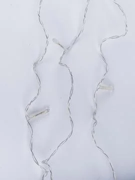 Unlit led string light strand tangled close up Stock Photos