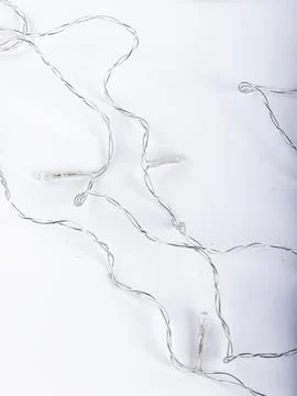 Unlit led string light strand tangled close up Stock Photos