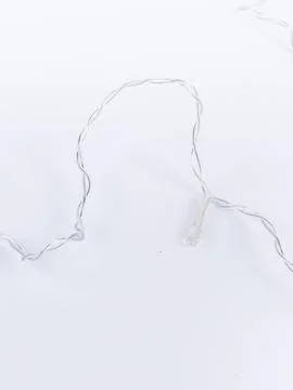 Unlit led string lights on white background Stock Photos
