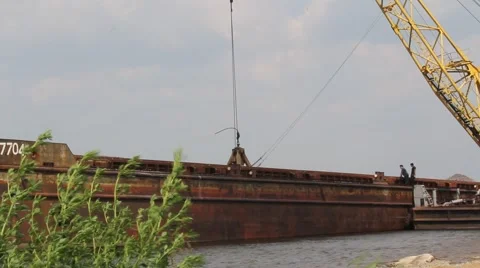 Unloading the barge Stock Footage 956426
