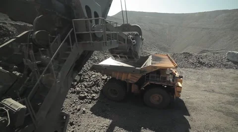 Unloading bucket to dump truck  native color Stock Footage 51449906