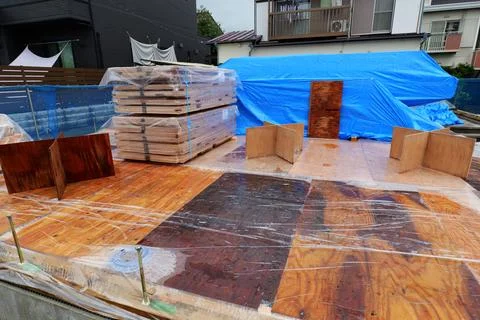 Unloading Building Materials at Construction Site Stock Photos