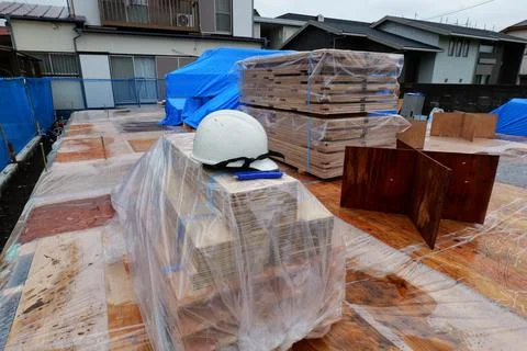 Unloading Building Materials at Construction Site Stock Photos