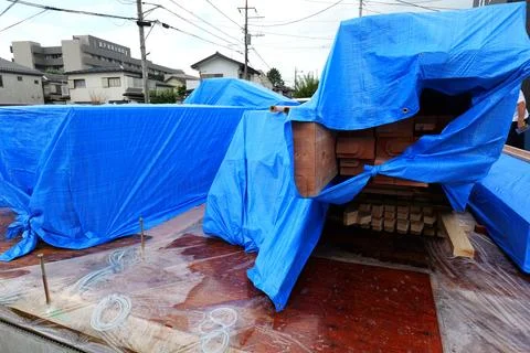 Unloading Building Materials at Construction Site Stock Photos