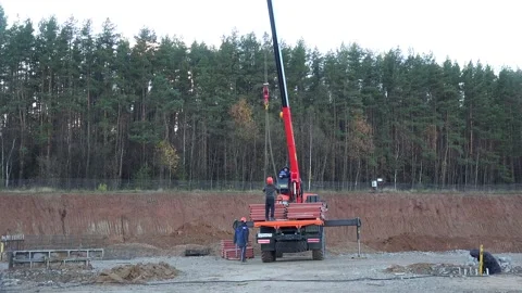 Unloading of building materials by the Material Handling Crane. 库存影片 239905036