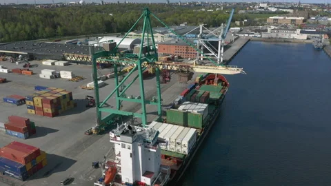 Unloading Cargo Container Ship at Port , aerial view Stock Footage 130593609