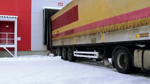 Unloading cargo from truck to warehouse Stock Footage 57759666
