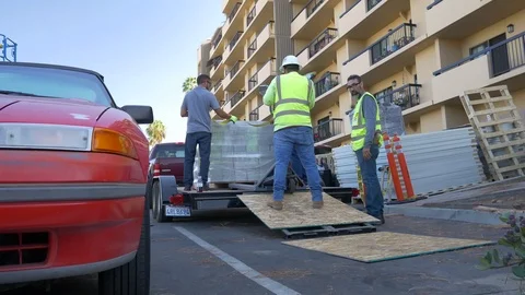 Unloading The Cinder Blocks Stock Footage 123947681