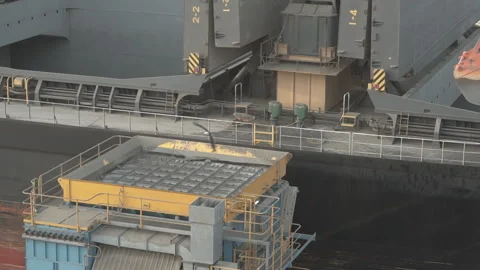 Unloading of a cmenet by hoe. Stock Footage 89935574