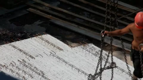 Unloading concrete slab by tower crane on residential building construction Stock Footage 40730587