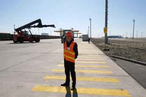 Unloading of containers at the station 스톡 사진