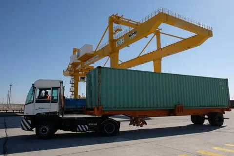 Unloading of containers at the station 스톡 사진