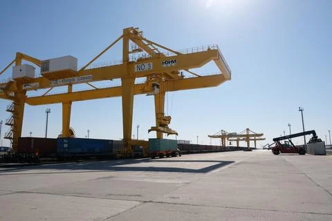 Unloading of containers at the station 스톡 사진