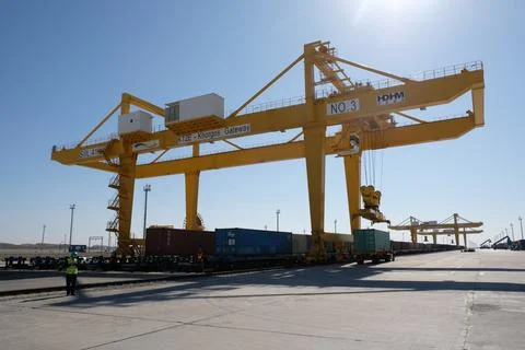 Unloading of containers at the station 스톡 사진