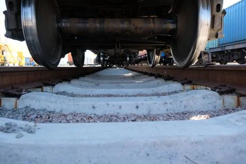 Unloading of containers at the station Stock Photos